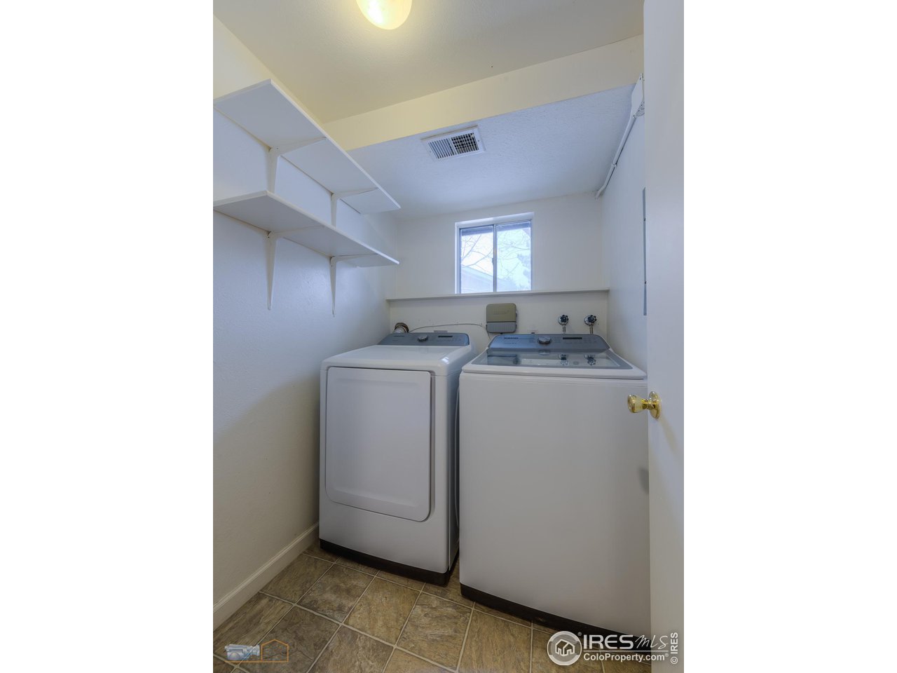 5484 Cypress Drive Boulder, CO 80303 - Photo 23 of 35 a utility room with dryer and washer