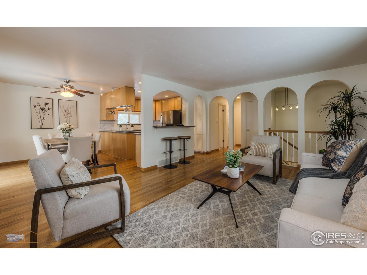 5484 Cypress Drive Boulder, CO 80303 - Photo 35 of 35 a living room with fireplace furniture and wooden floor