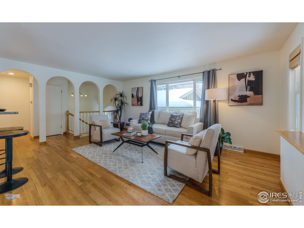 5484 Cypress Drive Boulder, CO 80303 - Photo 5 of 35 a living room with furniture and a wooden floor
