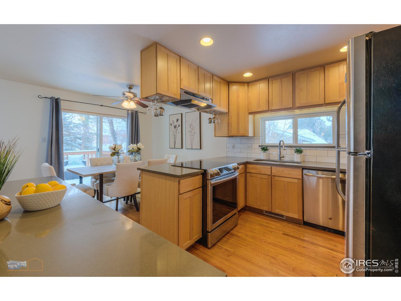 5484 Cypress Drive Boulder, CO 80303 - Photo 7 of 35 a kitchen with a sink appliances and cabinets