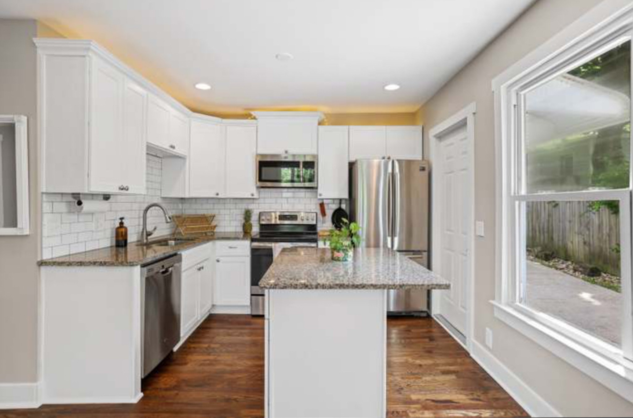 417 Lanier Drive Madison, TN 37115 - Photo 2 of 11 a kitchen with stainless steel appliances granite countertop a refrigerator a stove top oven a sink and dishwasher