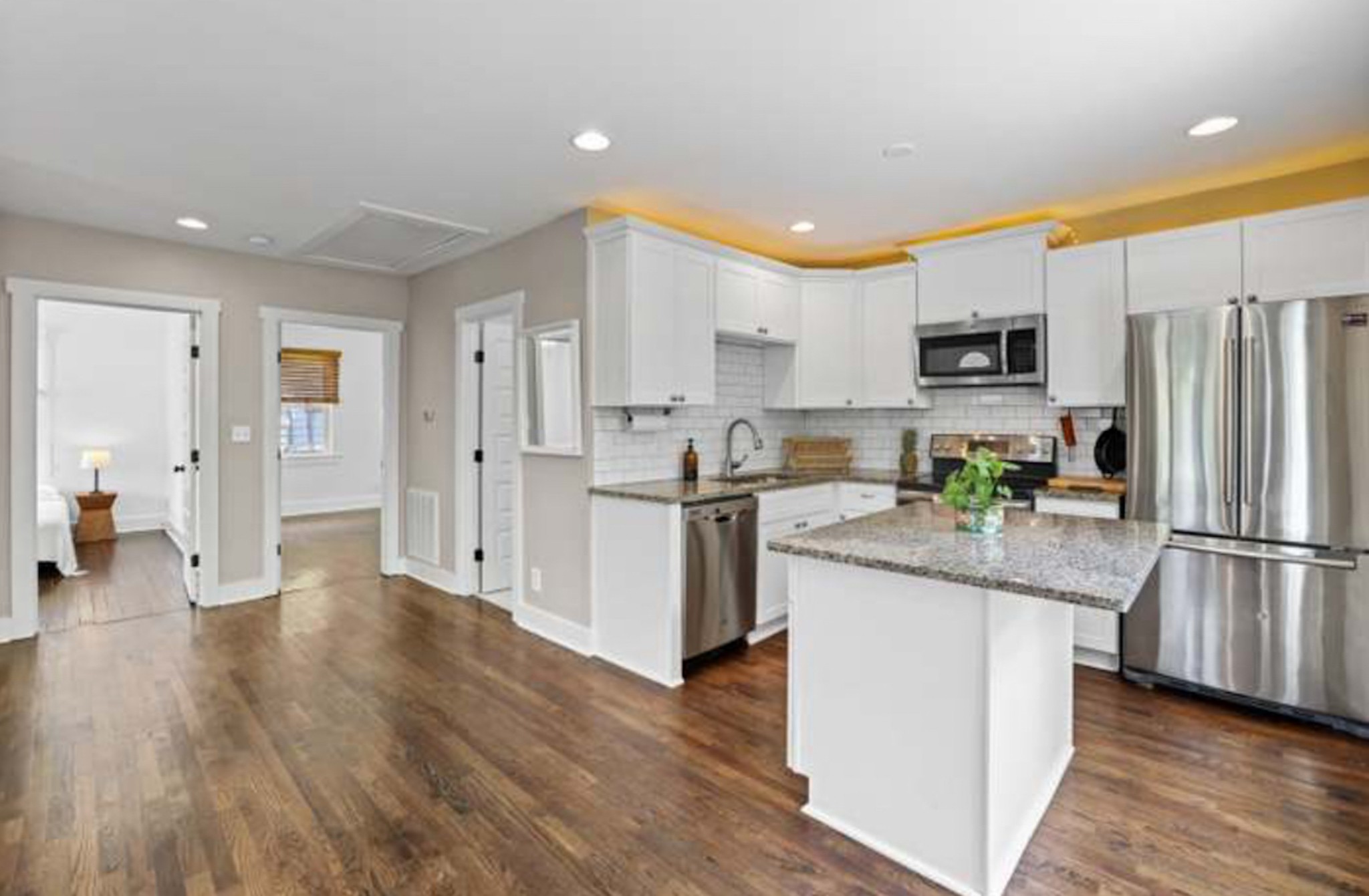 417 Lanier Drive Madison, TN 37115 - Photo 3 of 11 a kitchen with stainless steel appliances granite countertop a refrigerator a stove top oven a sink and dishwasher
