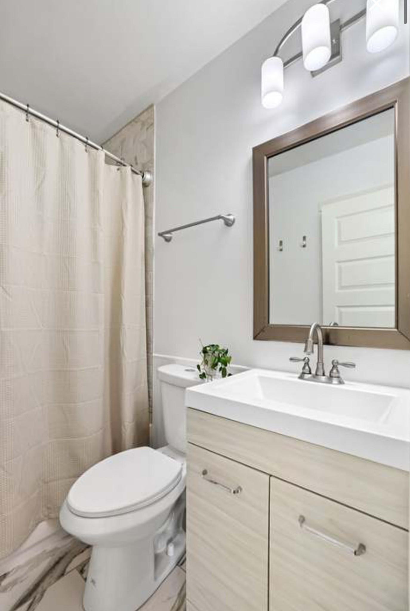 417 Lanier Drive Madison, TN 37115 - Photo 4 of 11 a bathroom with a sink a toilet and mirror