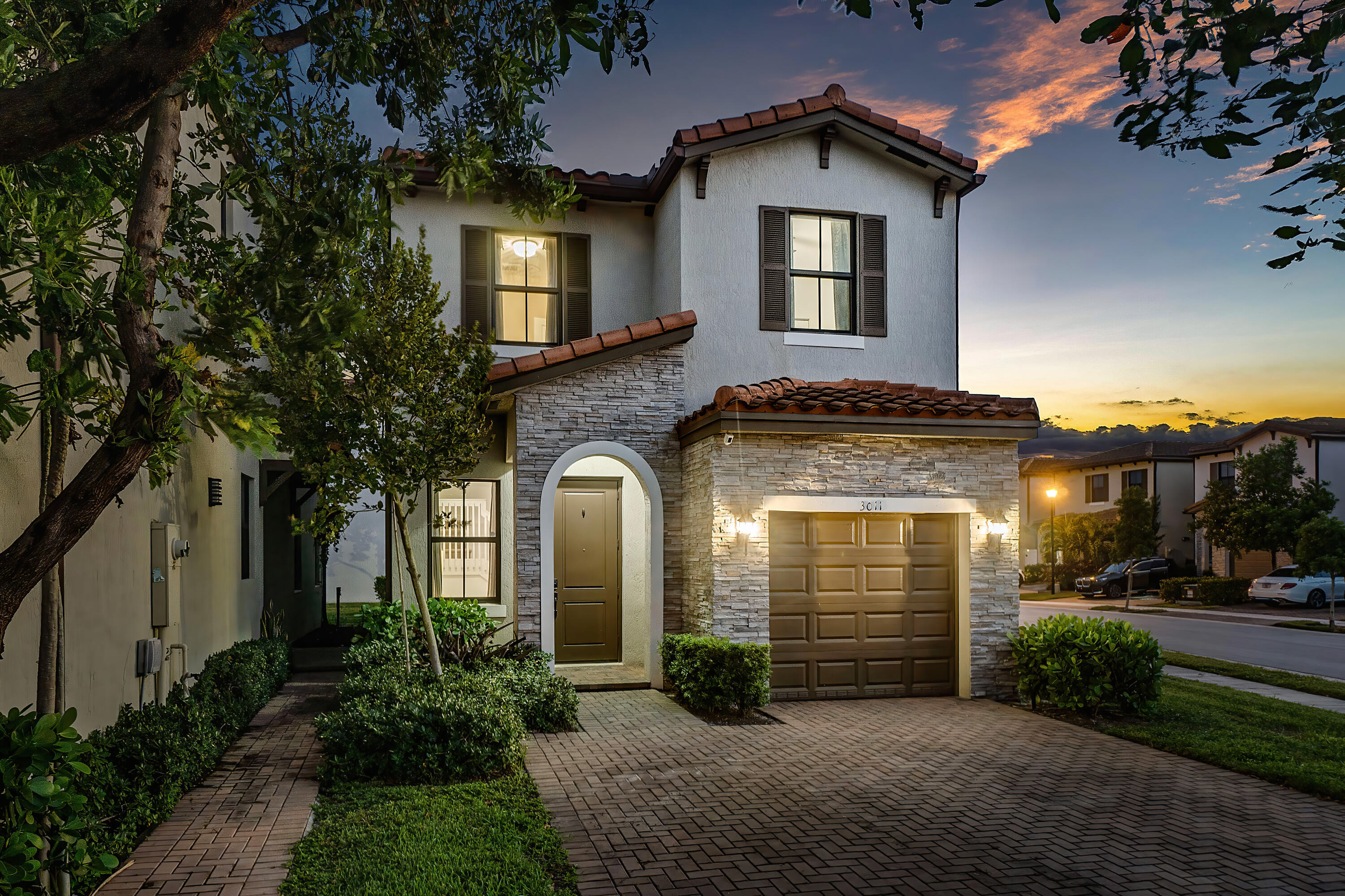 3011 Butternut Lane Riviera Beach, FL 33410 - Photo 1 of 45 Front Twilight