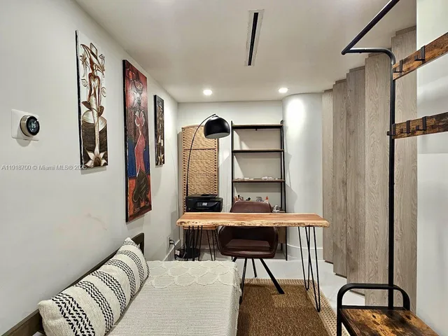 a view of swimming pool with outdoor seating and city view