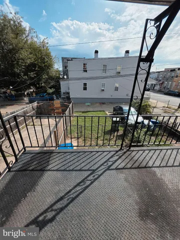 a view of a building with a bench