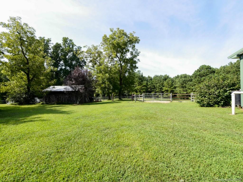 450 Old Carriage Road Clover, SC 29710 - Photo 12 of 23 a view of a garden and basketball court
