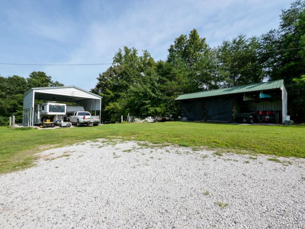 450 Old Carriage Road Clover, SC 29710 - Photo 15 of 23 a view of house with yard outdoor seating and entertaining space