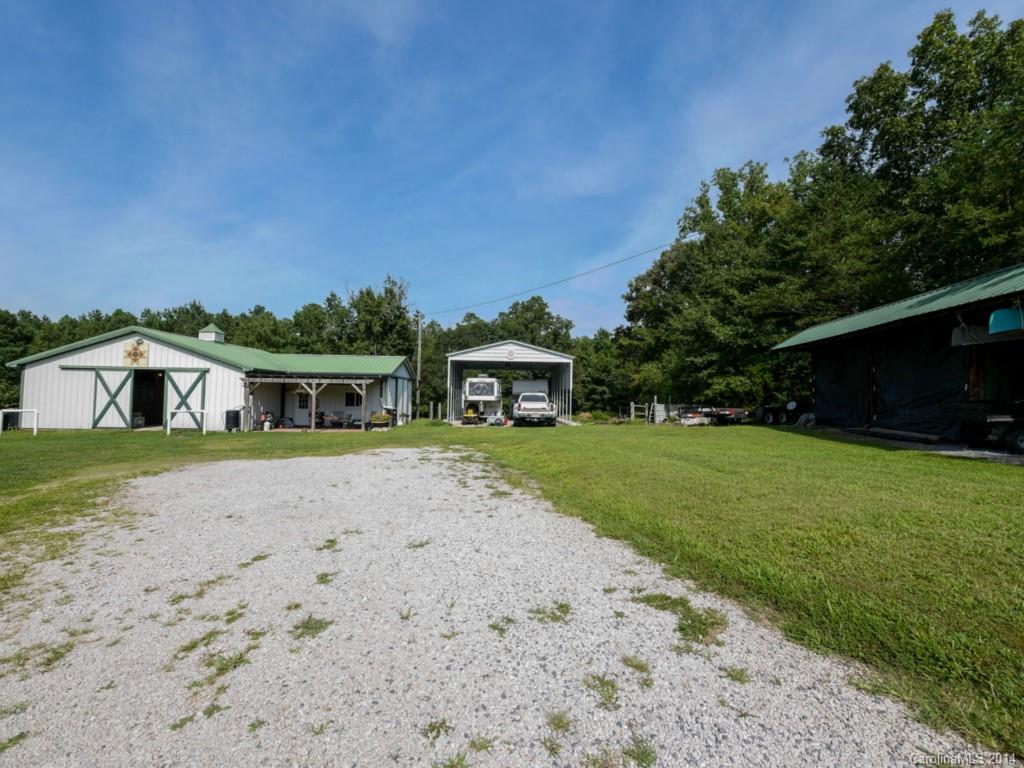450 Old Carriage Road Clover, SC 29710 - Photo 16 of 23 a front view of a house with a yard