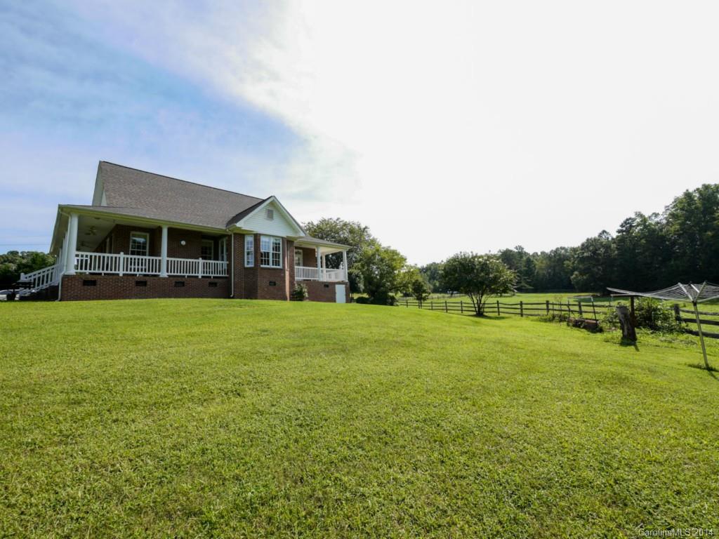 450 Old Carriage Road Clover, SC 29710 - Photo 5 of 23 a view of a house with a big yard