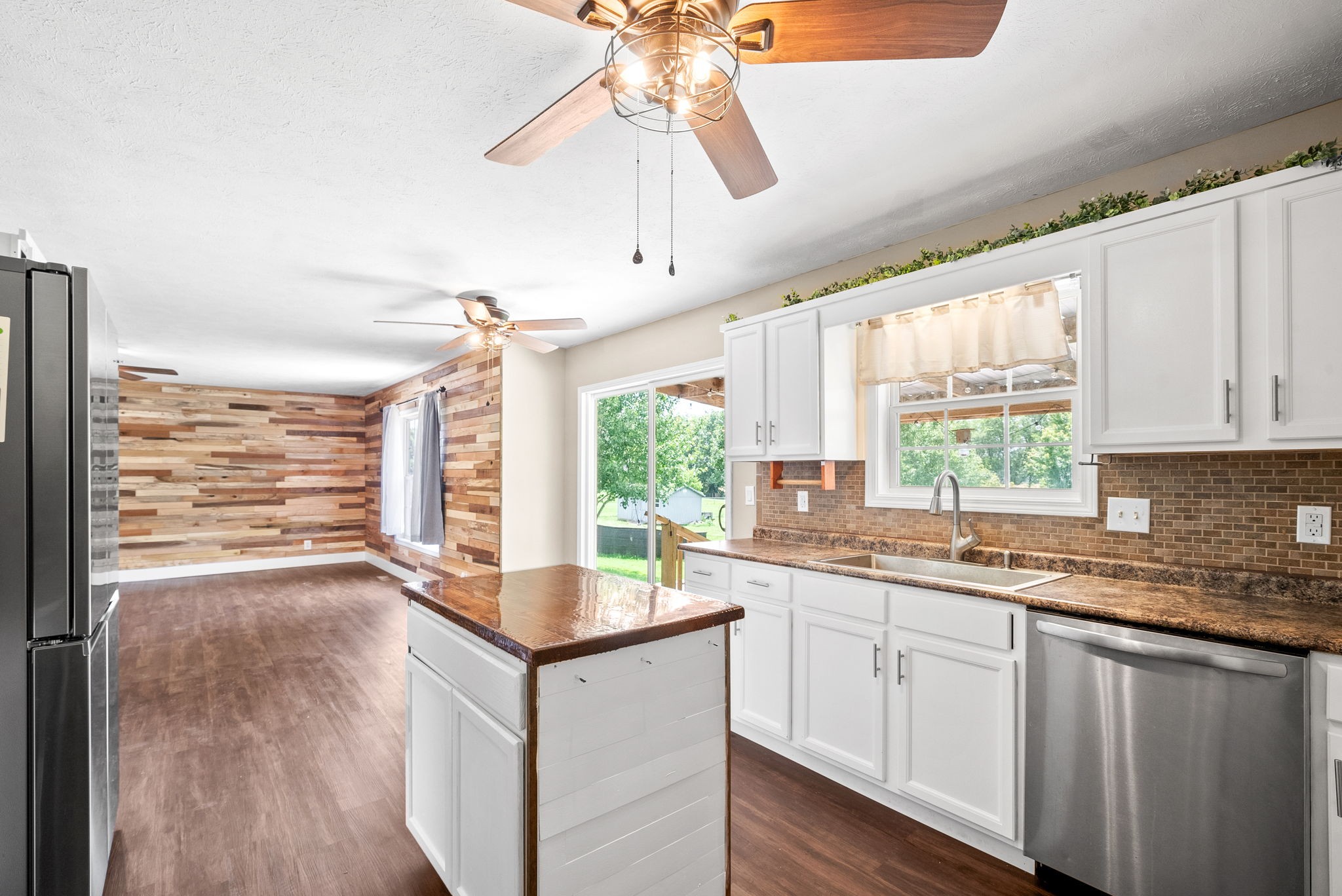 10383 Bell Station Road Oak Grove, KY 42262 - Photo 13 of 33 a kitchen with a sink cabinets and window
