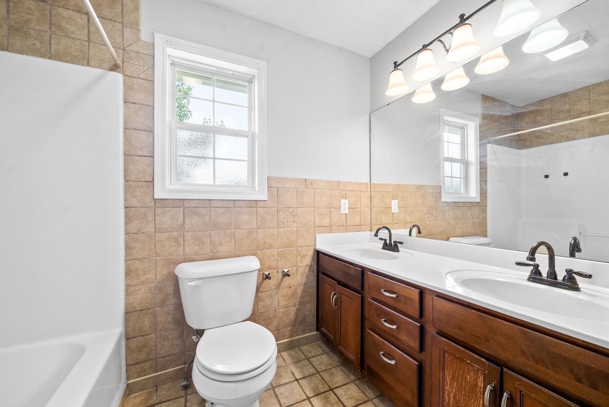 10383 Bell Station Road Oak Grove, KY 42262 - Photo 19 of 33 a bathroom with a toilet sink and mirror
