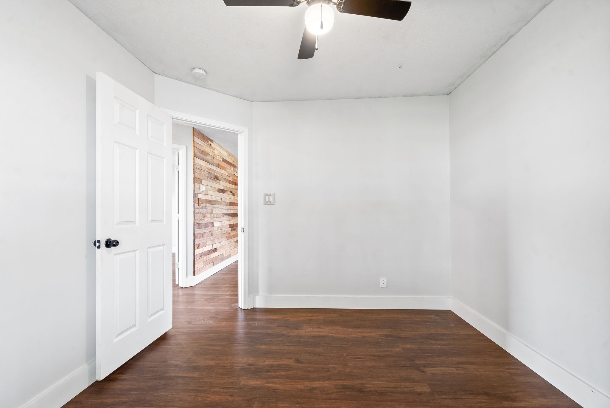 10383 Bell Station Road Oak Grove, KY 42262 - Photo 25 of 33 a view of an empty room with wooden floor