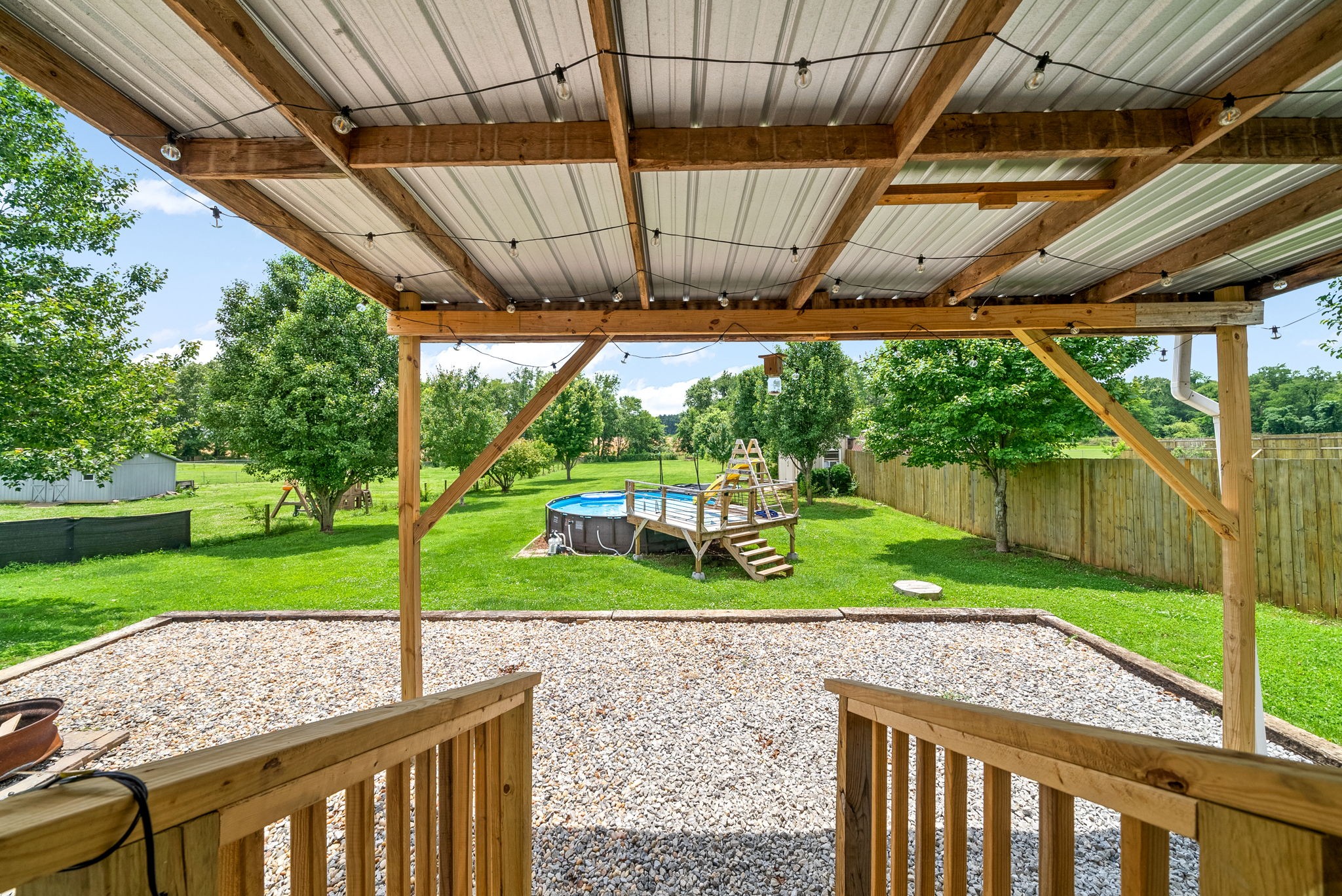 10383 Bell Station Road Oak Grove, KY 42262 - Photo 26 of 33 a view of a porch and garden