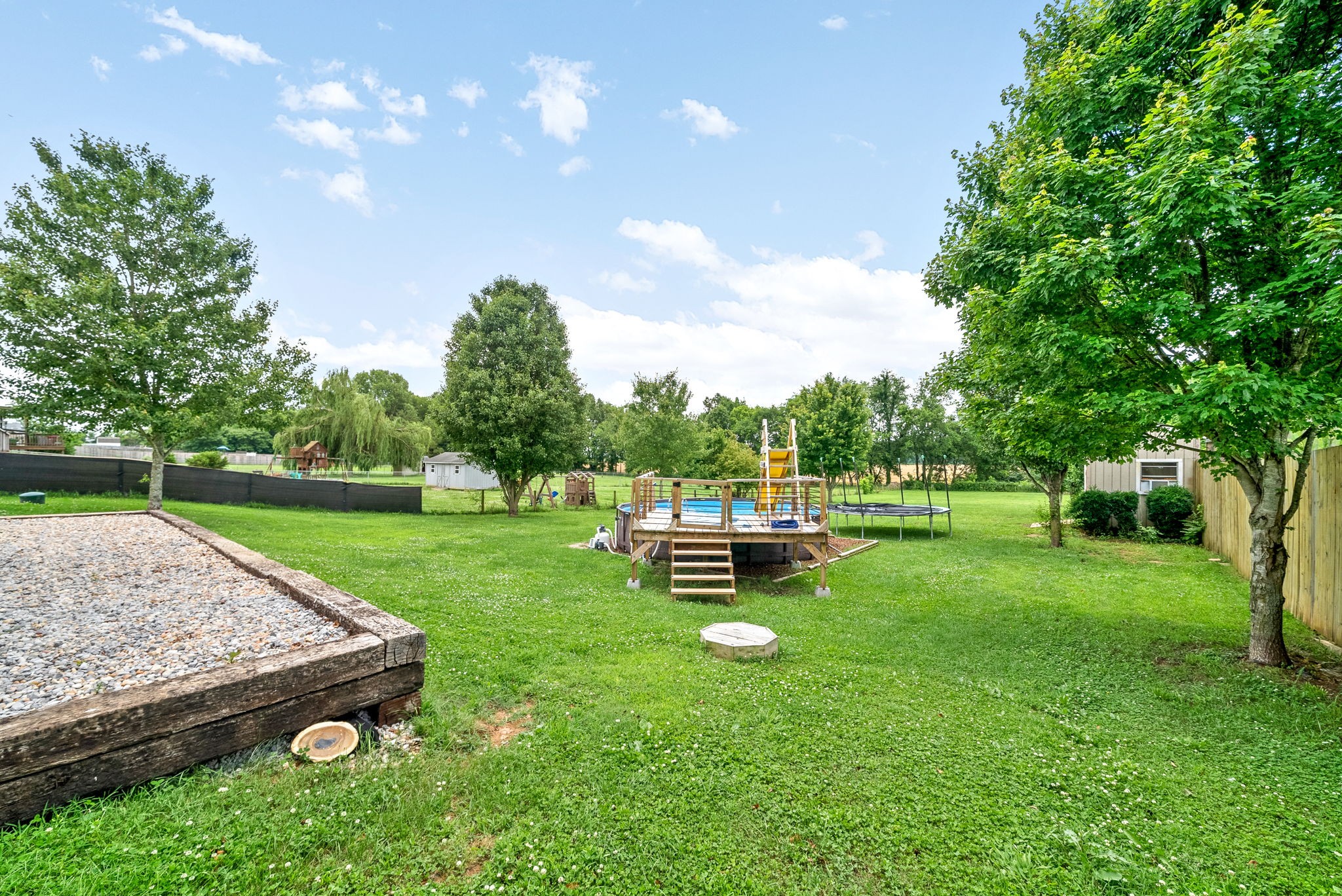 10383 Bell Station Road Oak Grove, KY 42262 - Photo 32 of 33 a garden view with a sitting space and garden