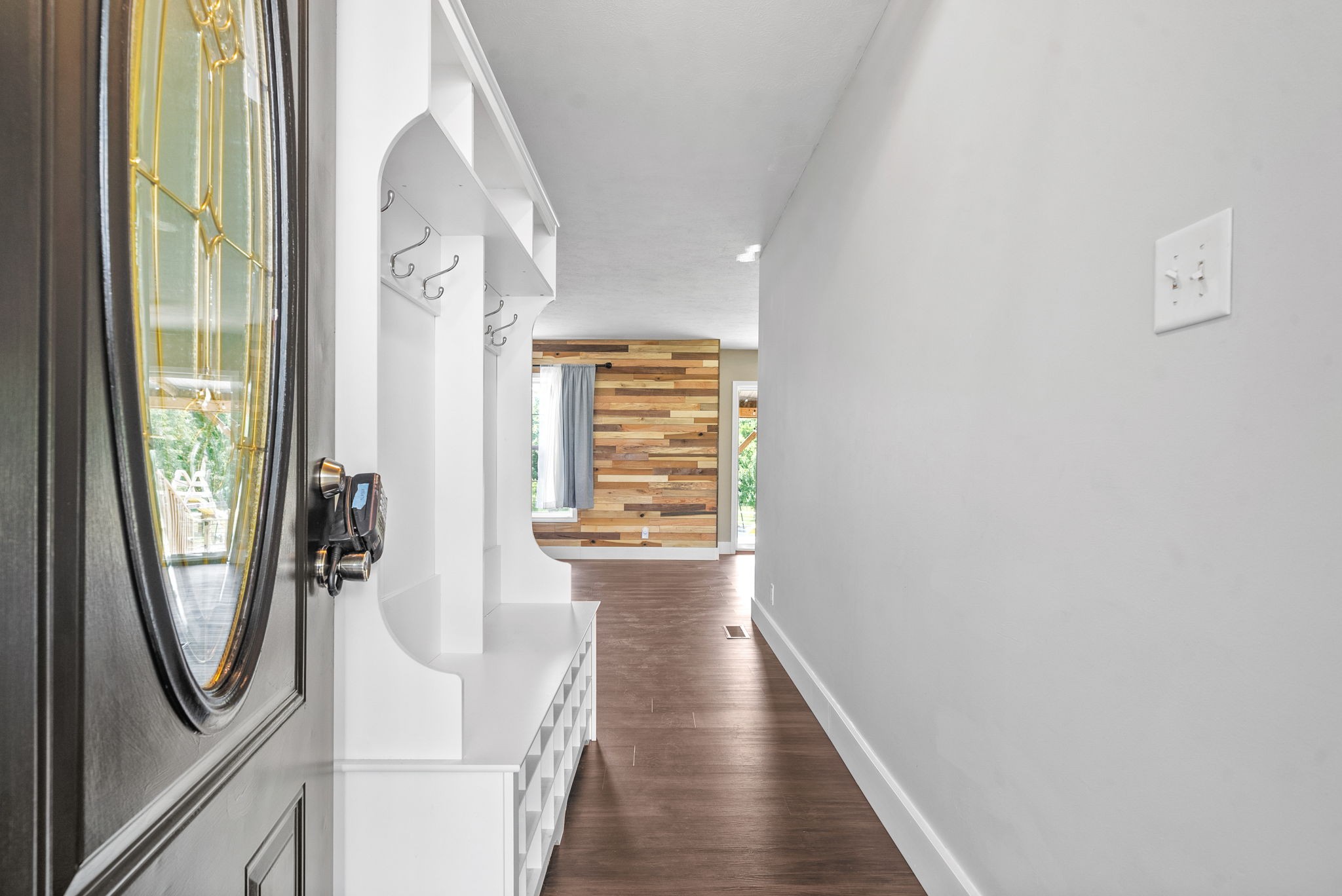 10383 Bell Station Road Oak Grove, KY 42262 - Photo 6 of 33 a view of a hallway with wooden floor and door