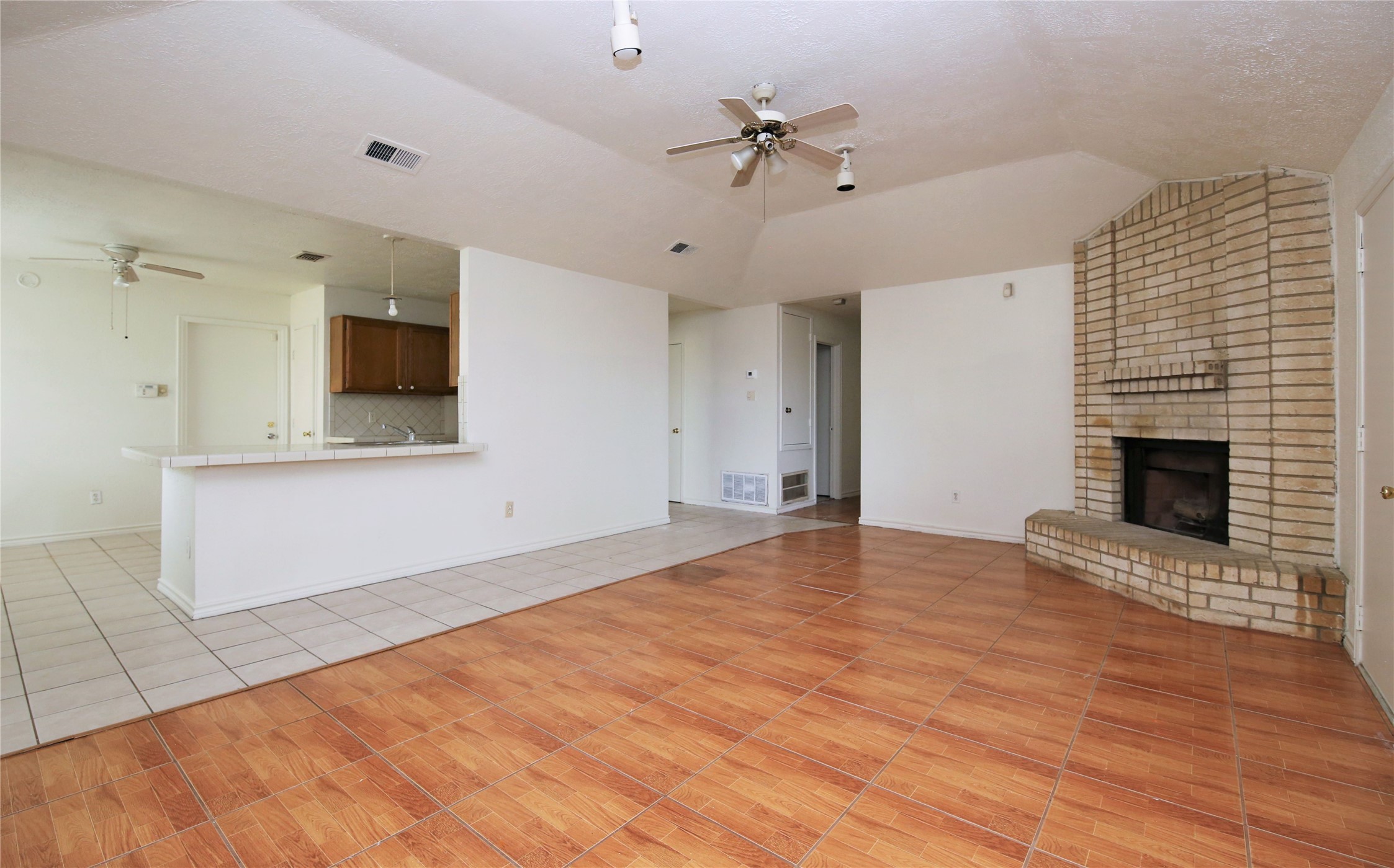 14211 Timberhaven Drive Houston, TX 77066 - Photo 5 of 19 a view of an empty room with a fireplace