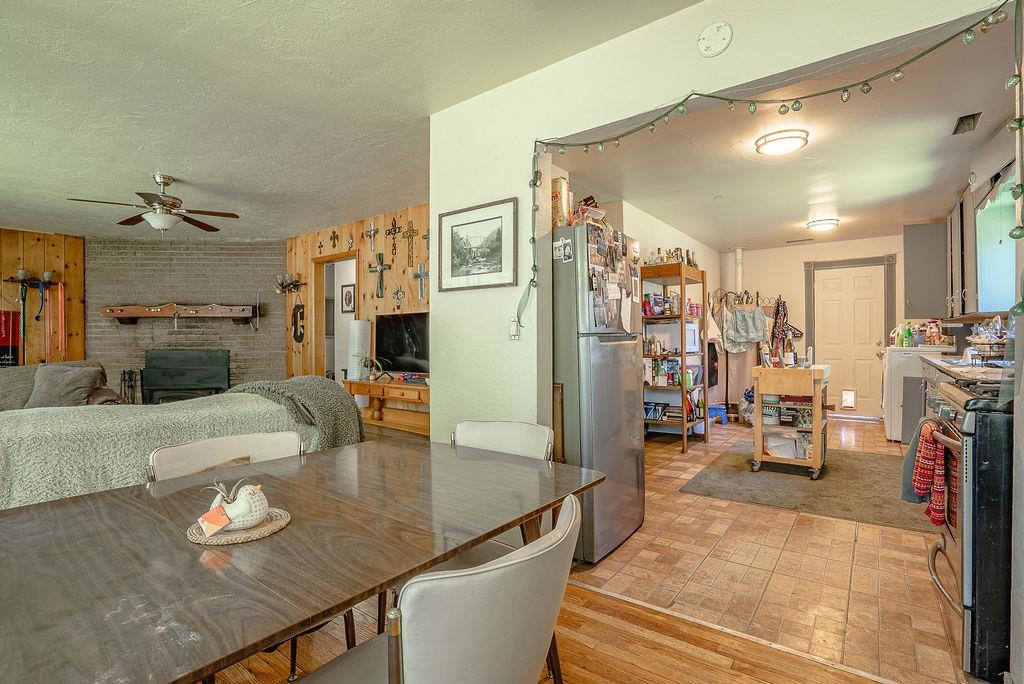 470 Riverside Avenue Chester, CA 96020 - Photo 8 of 25 a living room with furniture and a table