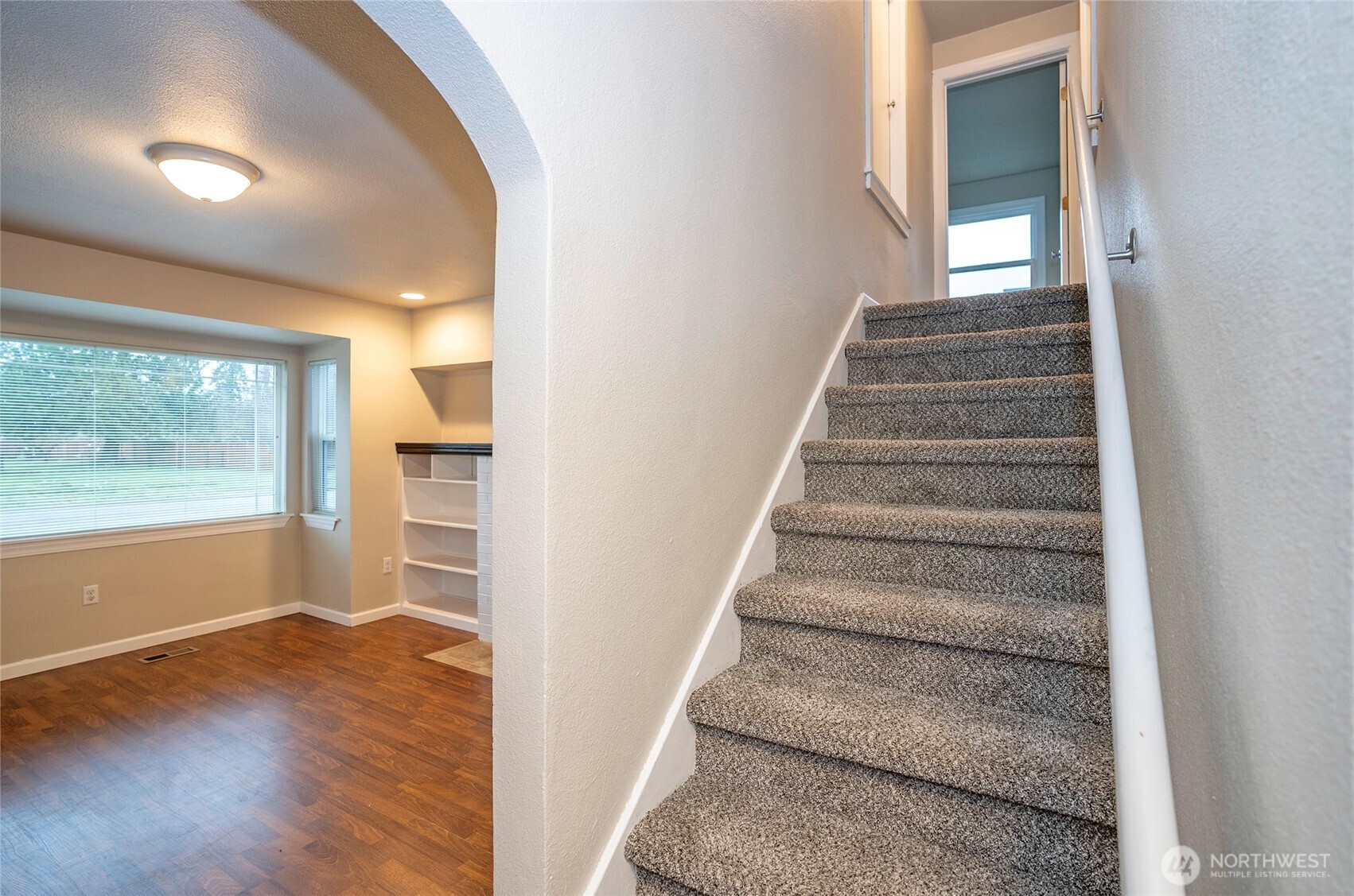407 18th Street Southwest Puyallup, WA 98371 - Photo 19 of 40 a view of an entryway with wooden floor and door