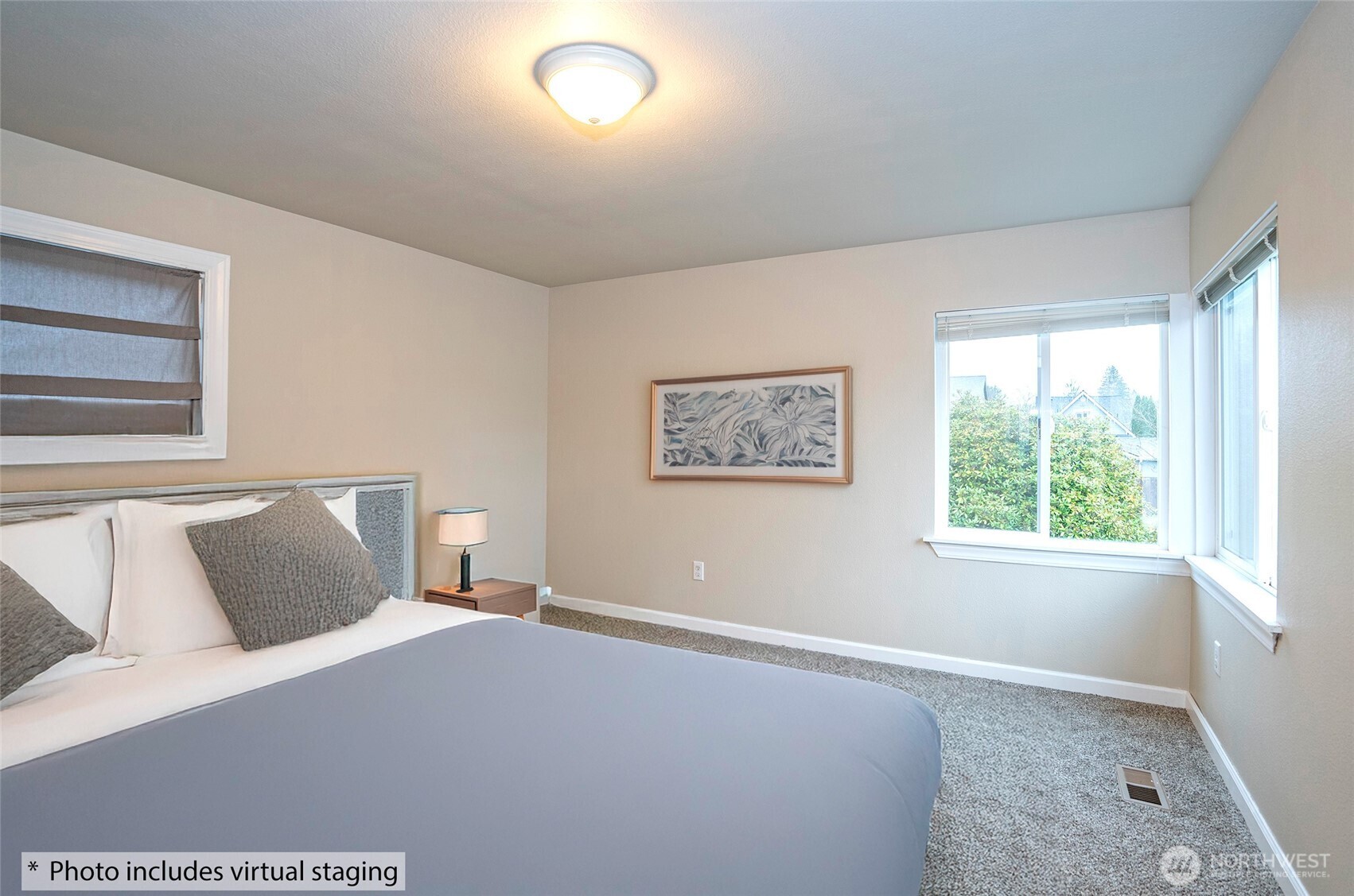 407 18th Street Southwest Puyallup, WA 98371 - Photo 22 of 40 a bedroom with a bed and a window