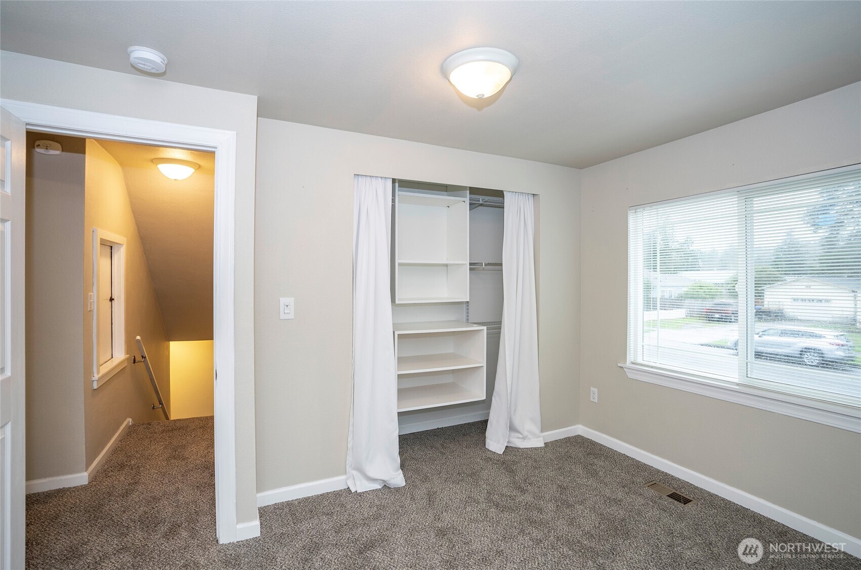 407 18th Street Southwest Puyallup, WA 98371 - Photo 24 of 40 a view of an empty room and a gallery