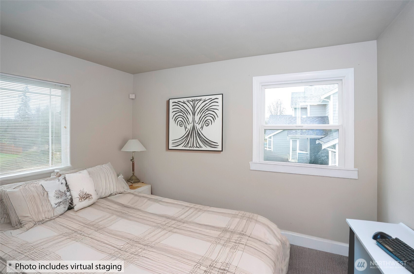 407 18th Street Southwest Puyallup, WA 98371 - Photo 26 of 40 a bedroom with a bed and a window