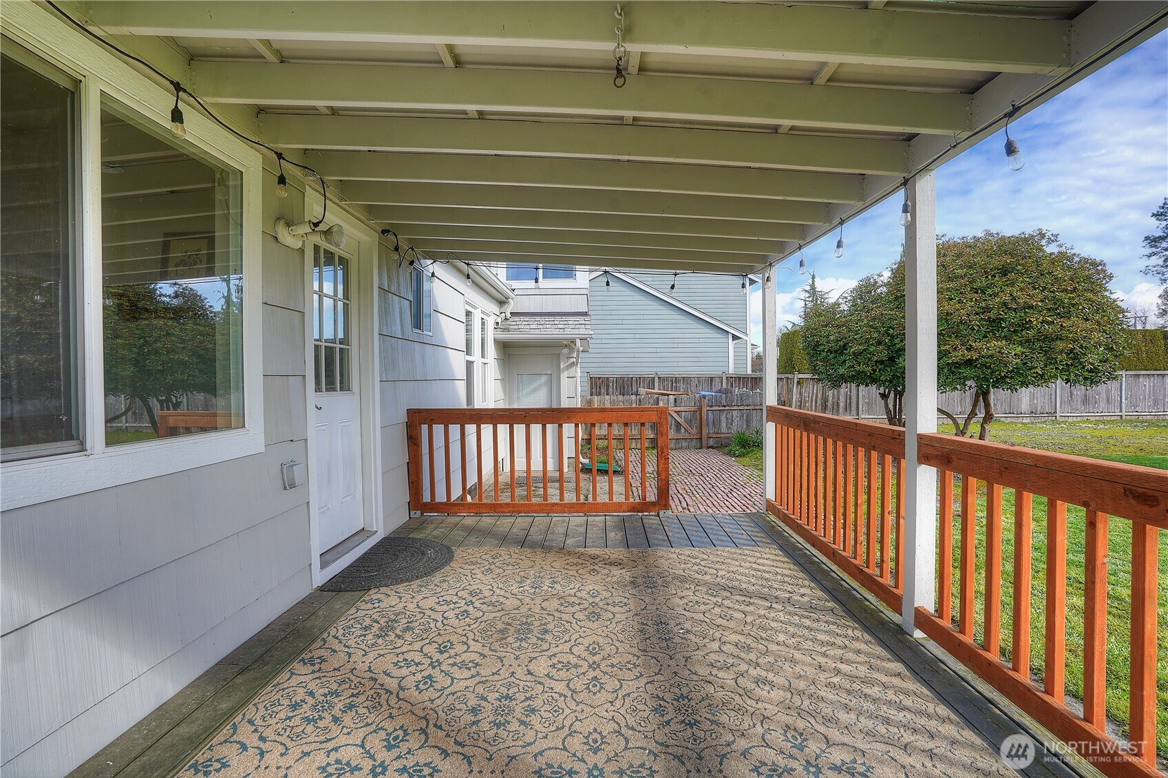 407 18th Street Southwest Puyallup, WA 98371 - Photo 30 of 40 a view of a porch with wooden floor