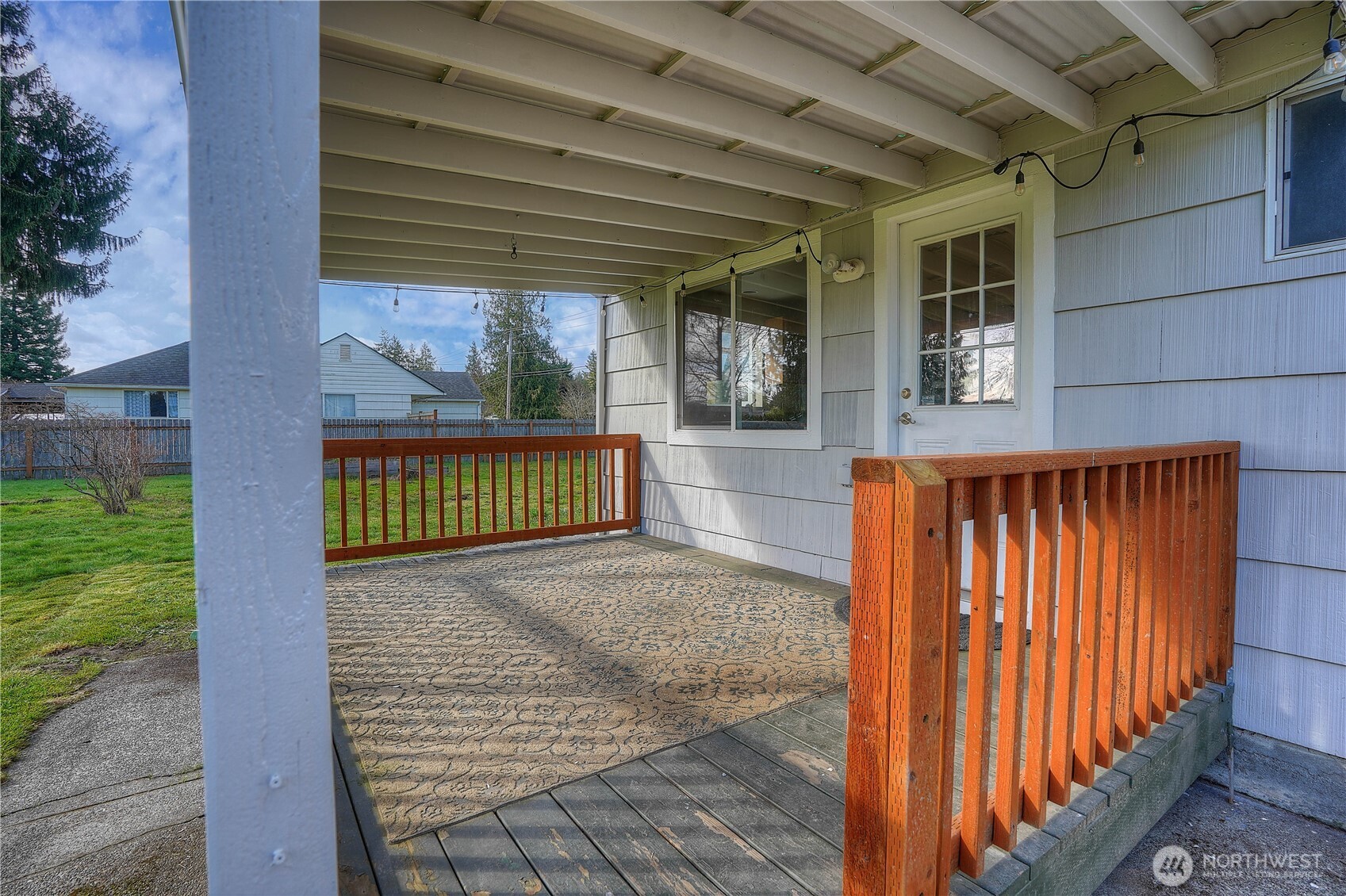 407 18th Street Southwest Puyallup, WA 98371 - Photo 32 of 40 a front view of a house with a porch