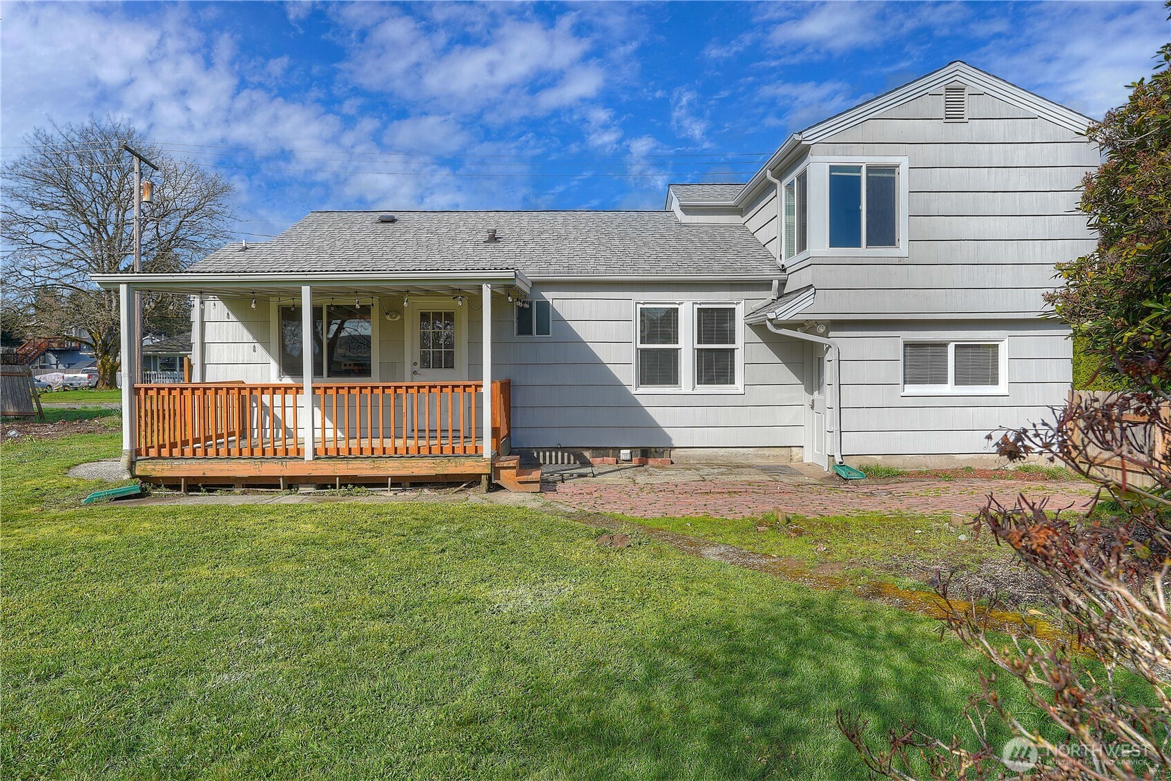 407 18th Street Southwest Puyallup, WA 98371 - Photo 33 of 40 a front view of a house with a yard