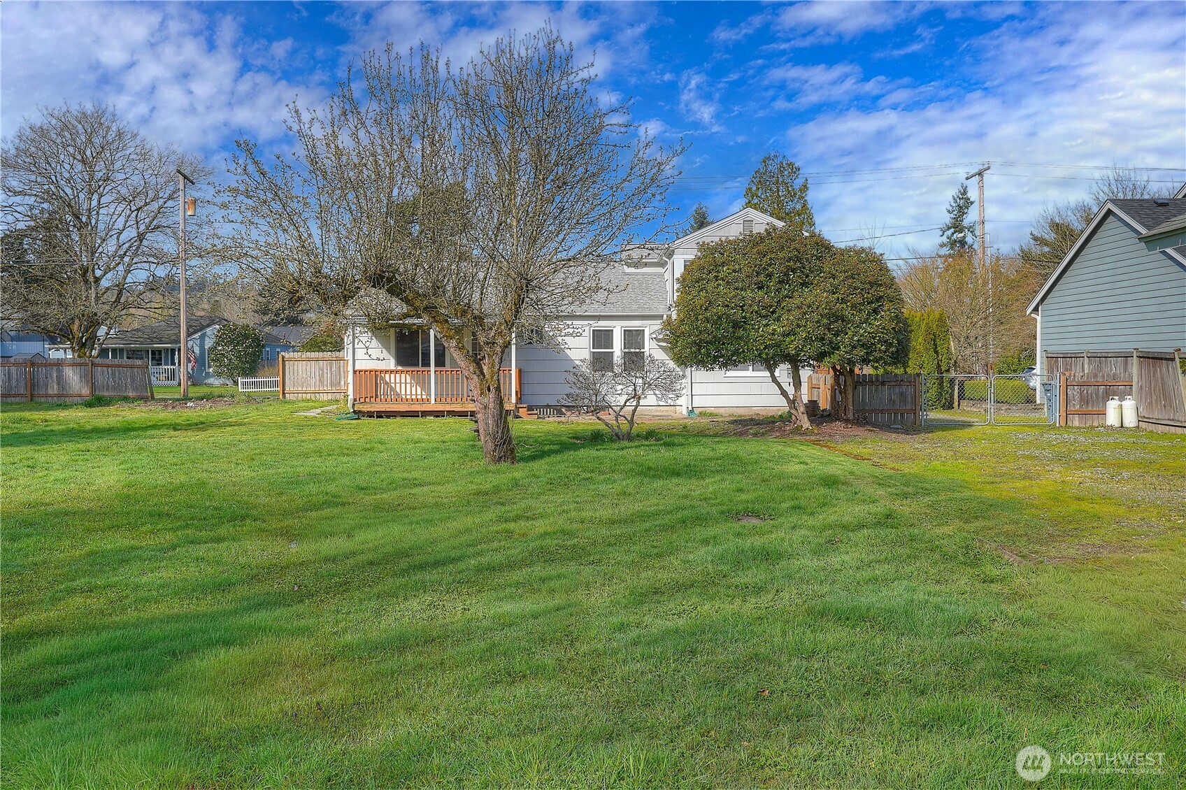 407 18th Street Southwest Puyallup, WA 98371 - Photo 34 of 40 a view of a house with a back yard
