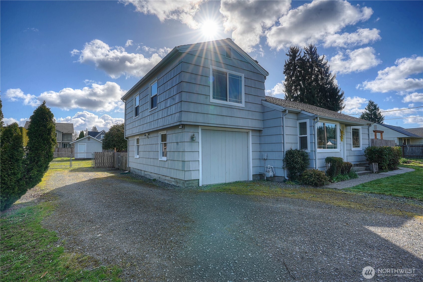 407 18th Street Southwest Puyallup, WA 98371 - Photo 40 of 40 a view of a house with a yard