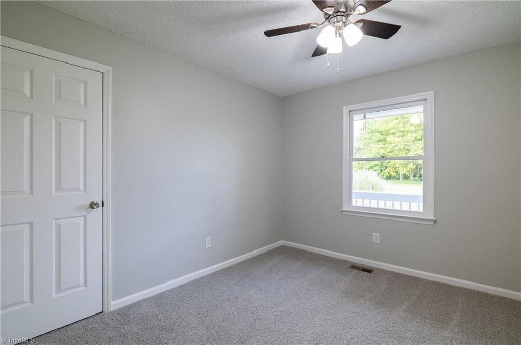 7211 Mason Road Climax, NC 27233 - Photo 14 of 31 Second Guest Bedroom with upgraded ceiling fan.