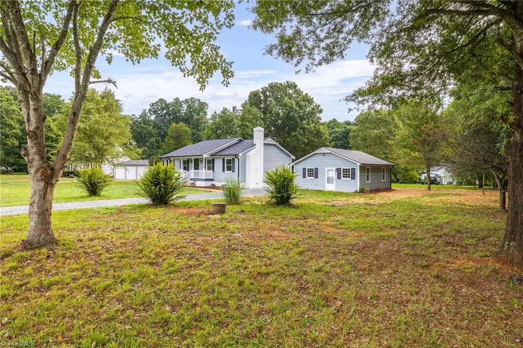 7211 Mason Road Climax, NC 27233 - Photo 21 of 31 a view of the home and property from the southwest corner of the property.