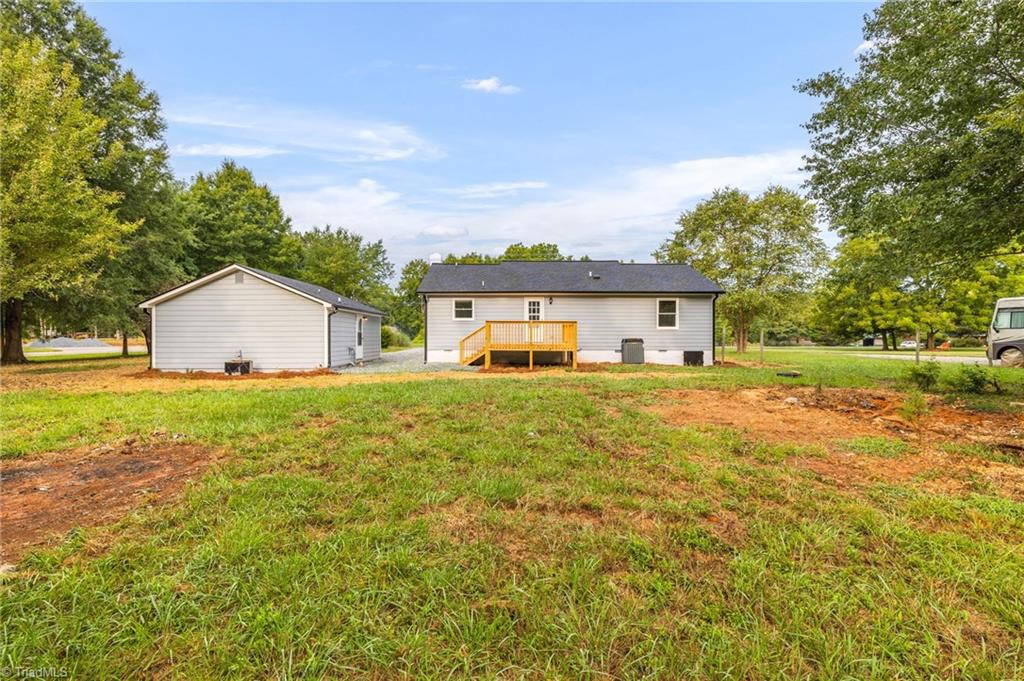 7211 Mason Road Climax, NC 27233 - Photo 23 of 31 A wonderful view of the back yard looking towards the home.