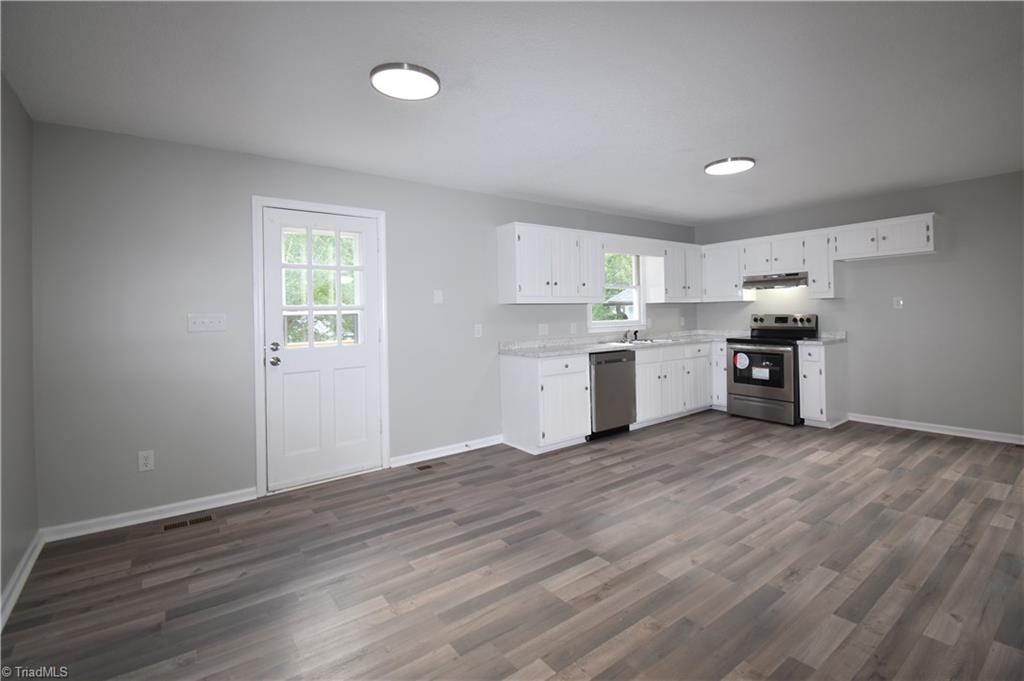 7211 Mason Road Climax, NC 27233 - Photo 6 of 31 the kitchen and dinning area are nice and open concept so everyone can join in the fun.