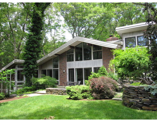 20 Spruce Hill Road Weston, MA 02493 - Photo 1 of 1 a front view of a house with a yard