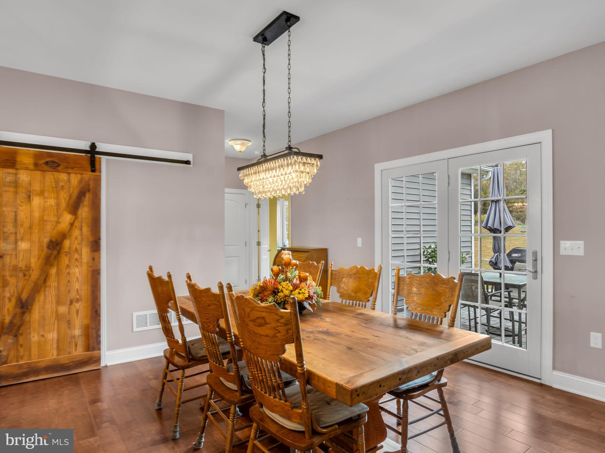 984 Pine Road Carlisle, PA 17015 - Photo 13 of 70 a view of a dining room with furniture and wooden floor