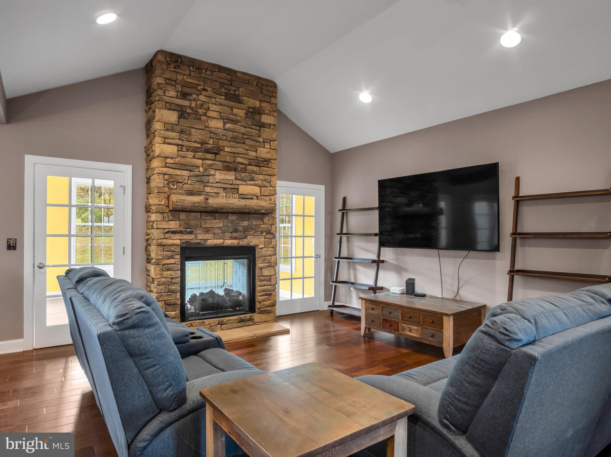 984 Pine Road Carlisle, PA 17015 - Photo 16 of 70 a living room with furniture and a flat screen tv