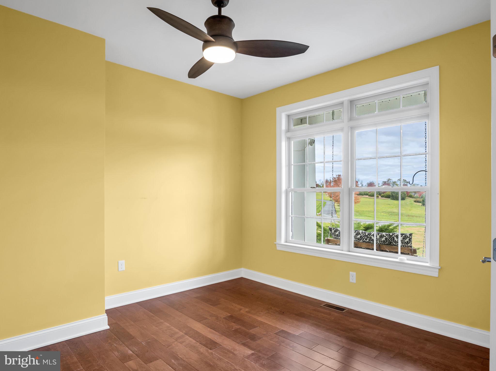 984 Pine Road Carlisle, PA 17015 - Photo 22 of 70 a view of an empty room with window and wooden floor