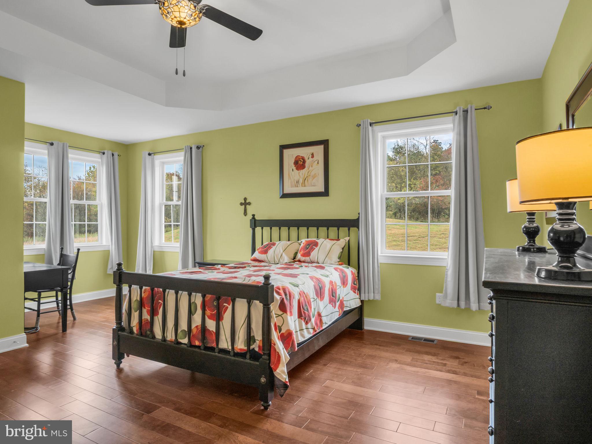 984 Pine Road Carlisle, PA 17015 - Photo 26 of 70 a bed sitting in a spacious bedroom next to a window