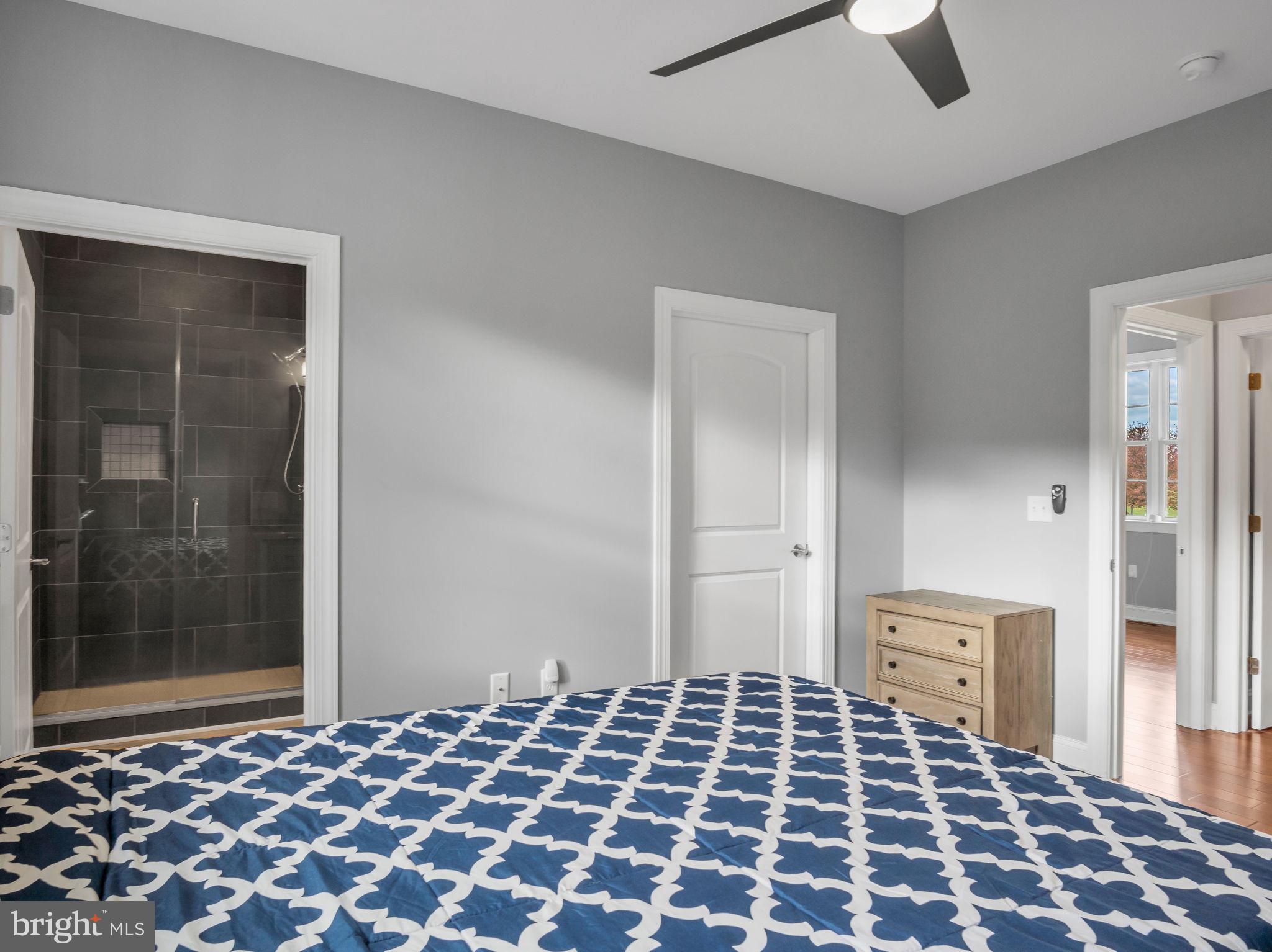 984 Pine Road Carlisle, PA 17015 - Photo 32 of 70 a bedroom with a bed and a mirror