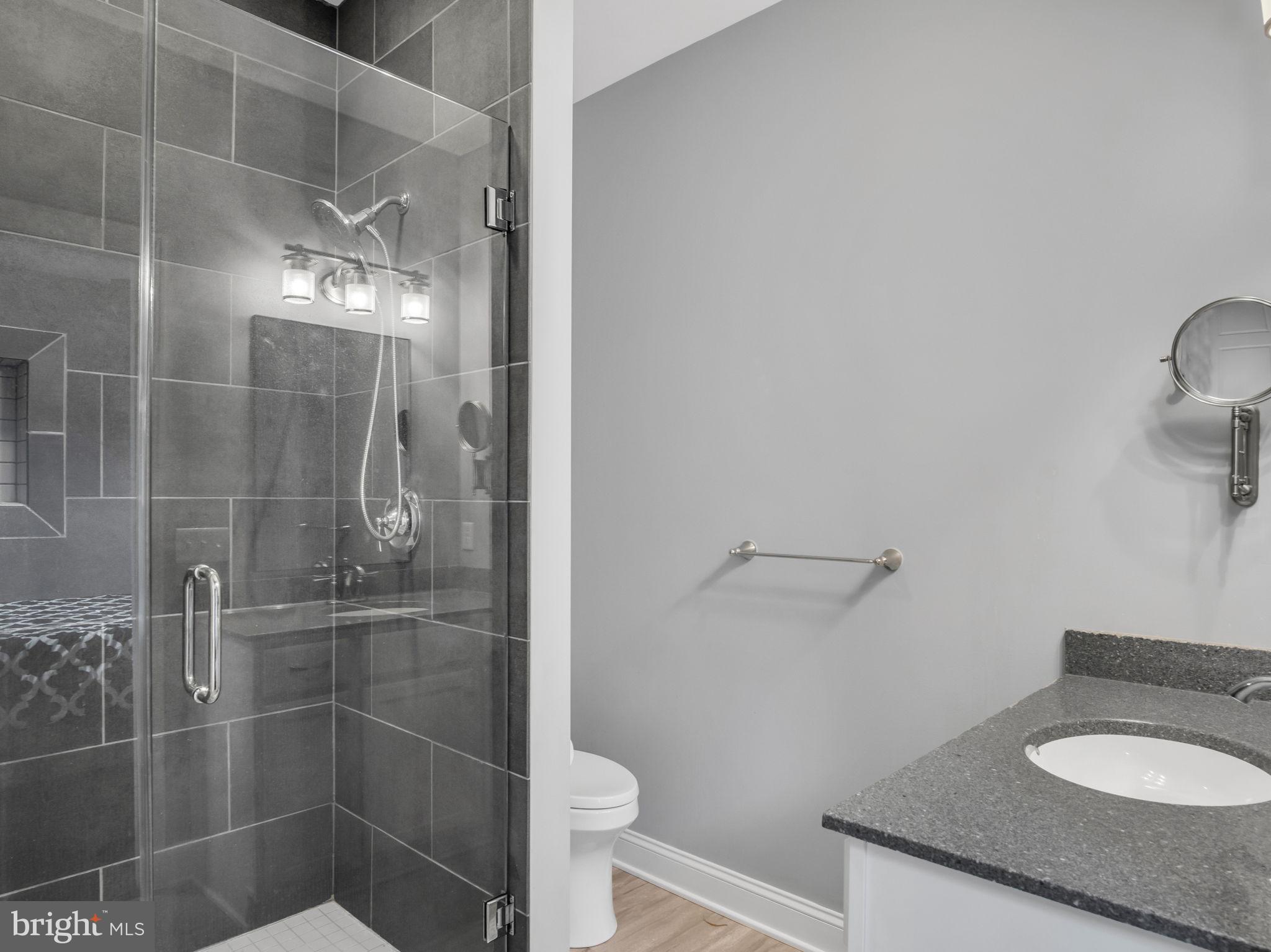 984 Pine Road Carlisle, PA 17015 - Photo 33 of 70 a bathroom with a granite countertop shower and a sink