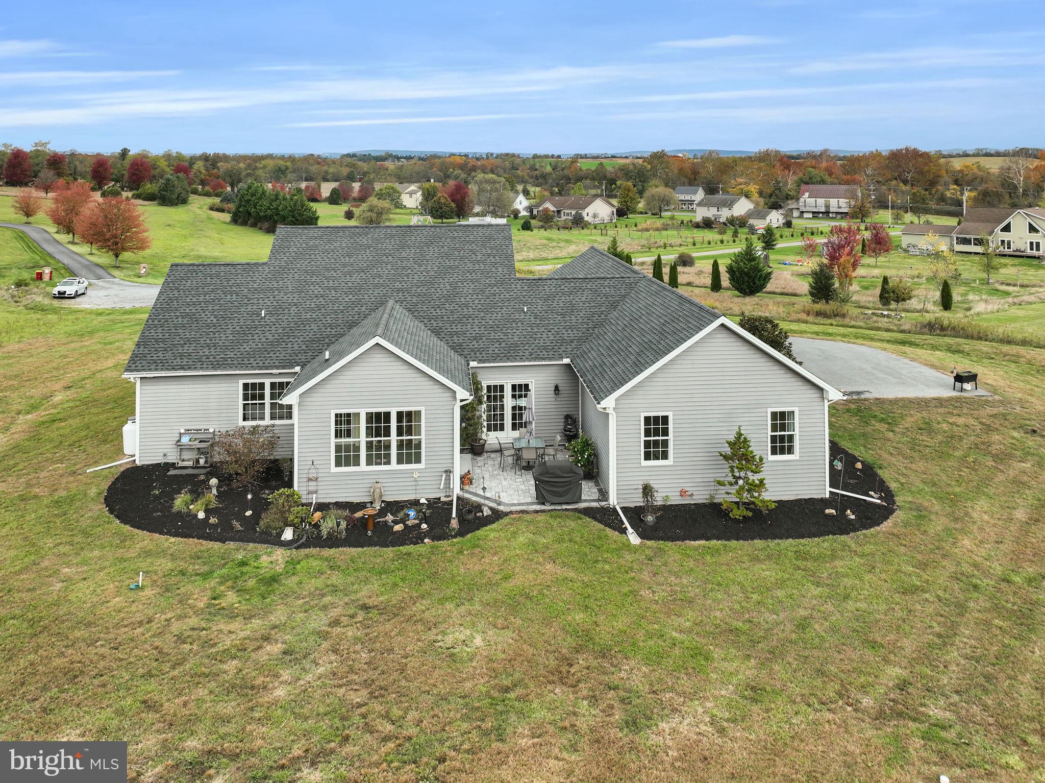 984 Pine Road Carlisle, PA 17015 - Photo 46 of 70 an aerial view of a house with a yard and lake view