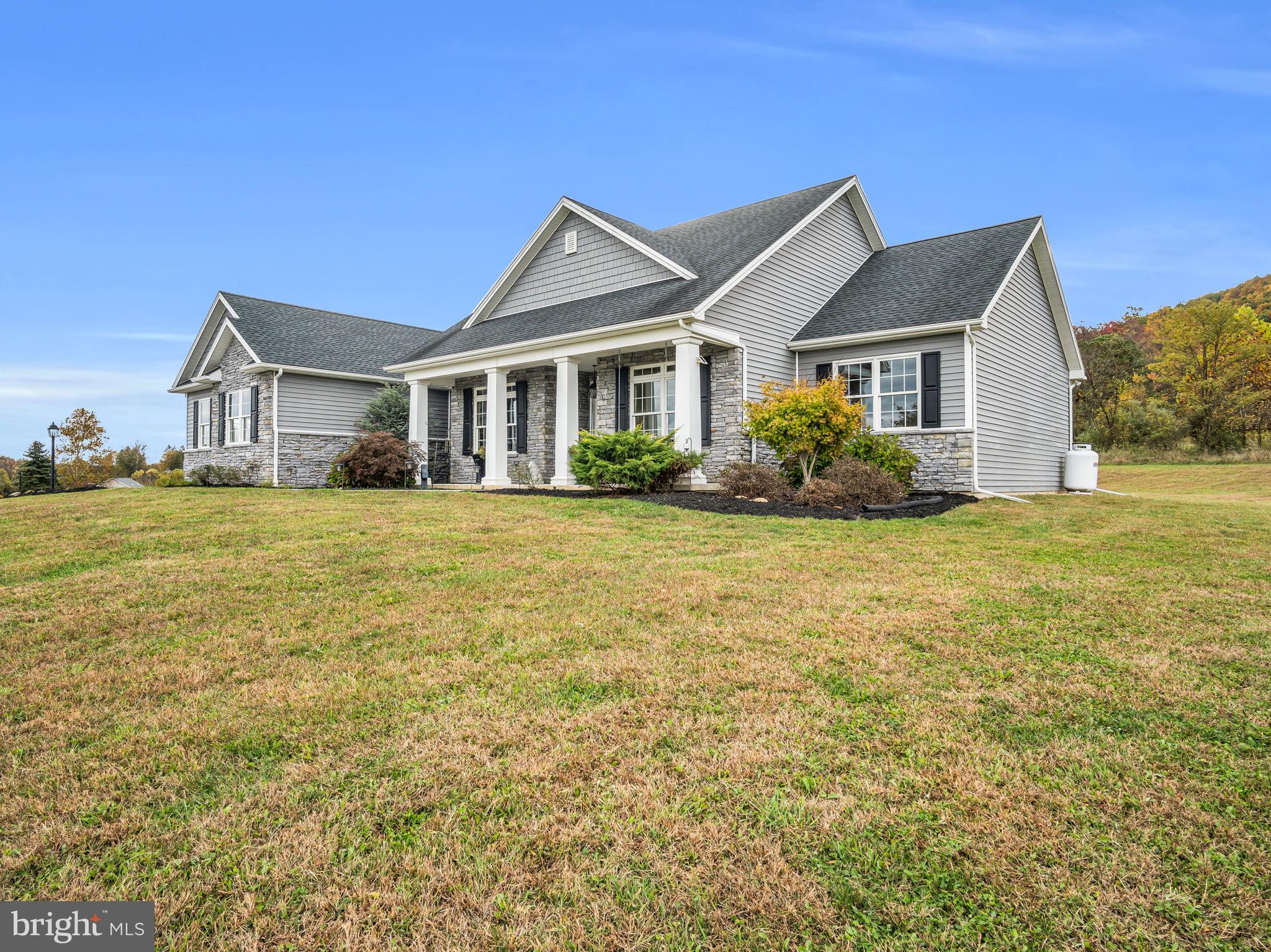 984 Pine Road Carlisle, PA 17015 - Photo 5 of 70 a front view of a house with a yard