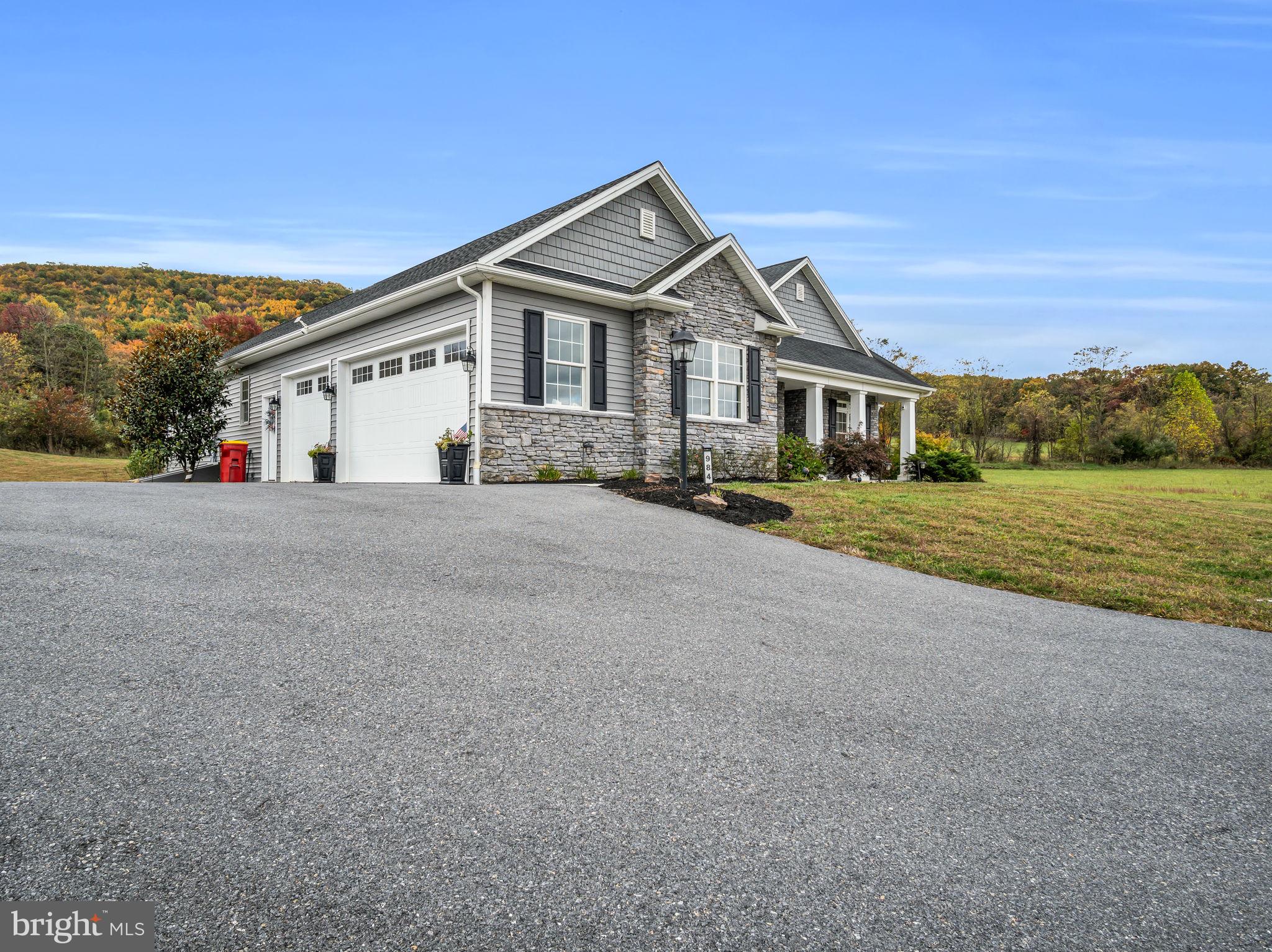984 Pine Road Carlisle, PA 17015 - Photo 6 of 70 a front view of a house with a yard