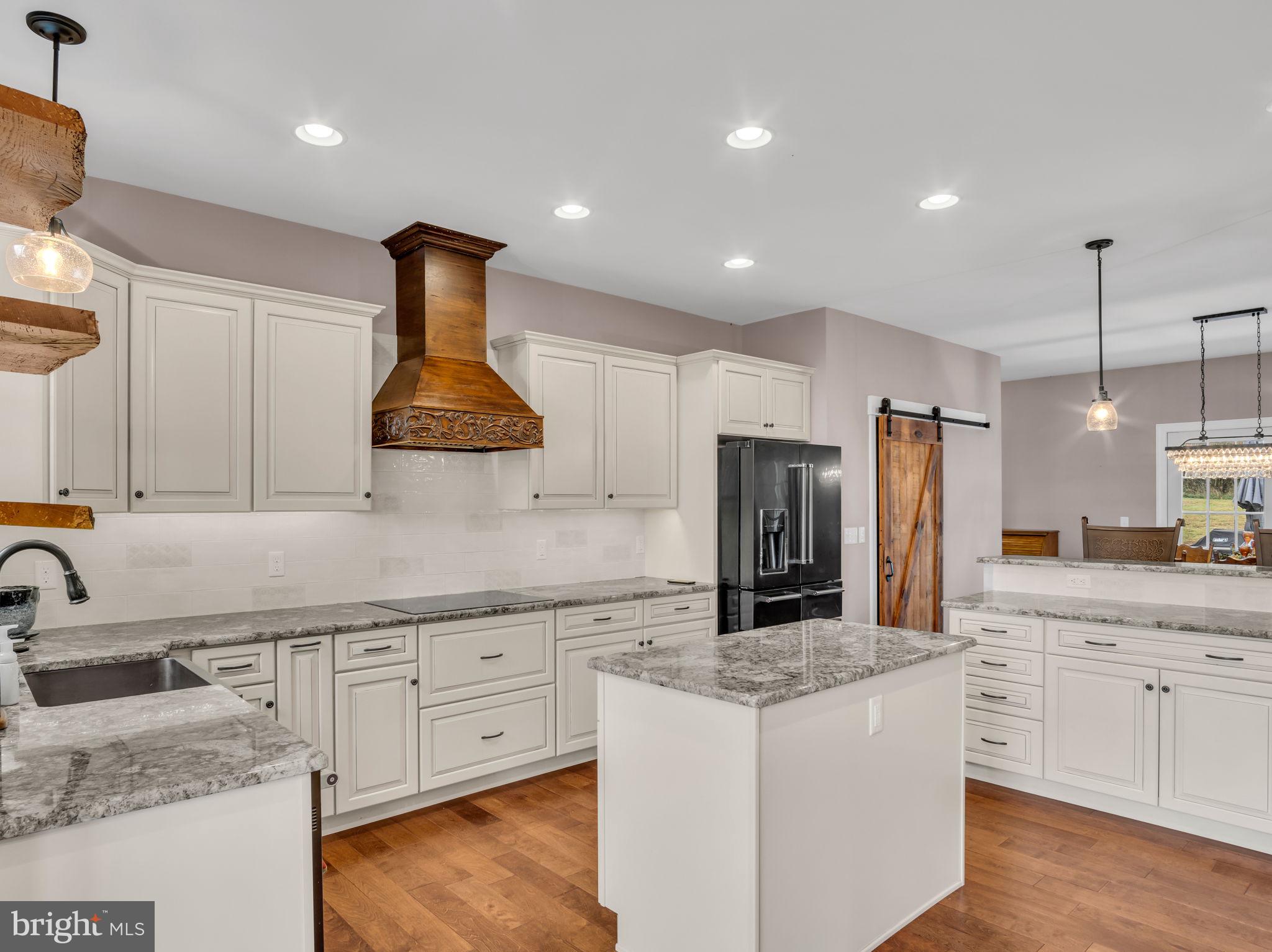 984 Pine Road Carlisle, PA 17015 - Photo 7 of 70 a kitchen with stainless steel appliances granite countertop a sink stove and refrigerator