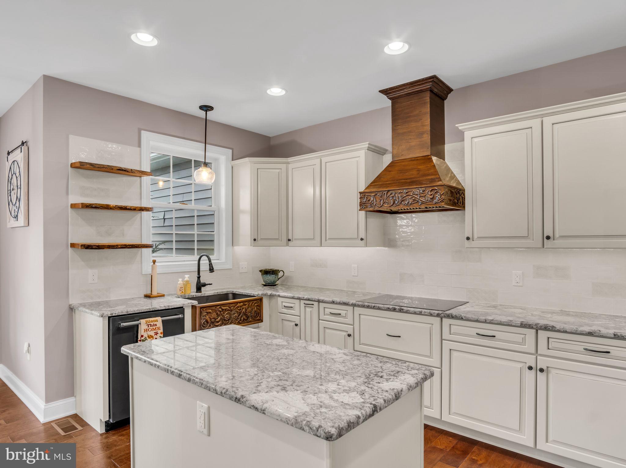 984 Pine Road Carlisle, PA 17015 - Photo 8 of 70 a kitchen with stainless steel appliances granite countertop a sink stove and cabinets