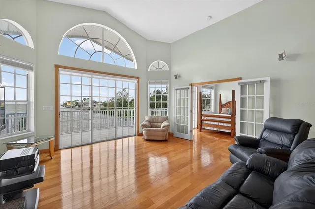 a swimming pool with an outdoor seating and yard