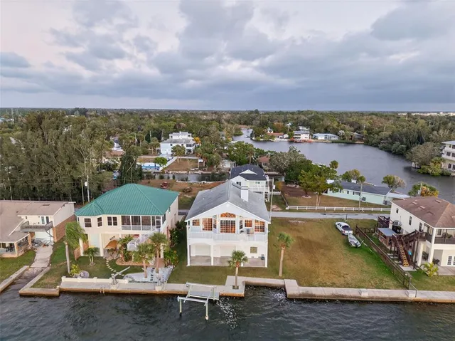 a bedroom with a large bed and a large window