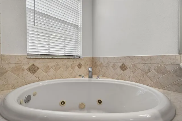 a living room with kitchen and furniture